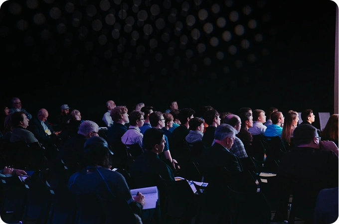 Audience attending a corporate event